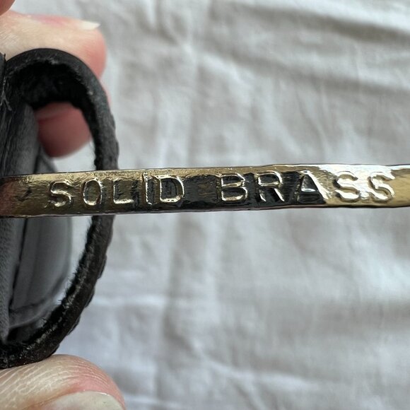 Woven Leather Belt with Brass buckle and hearts going around belt silver look